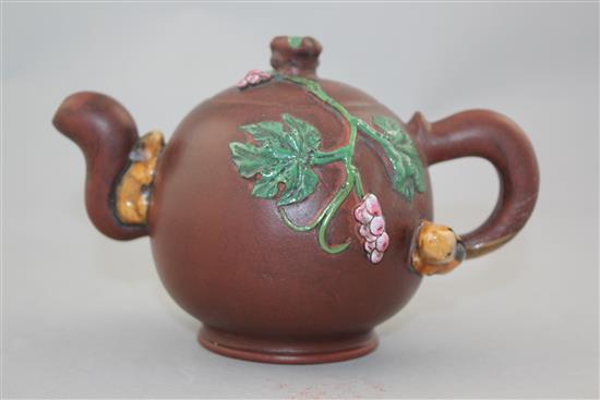 A Chinese Yixing enamelled pottery teapot, 20th century, 12cm.